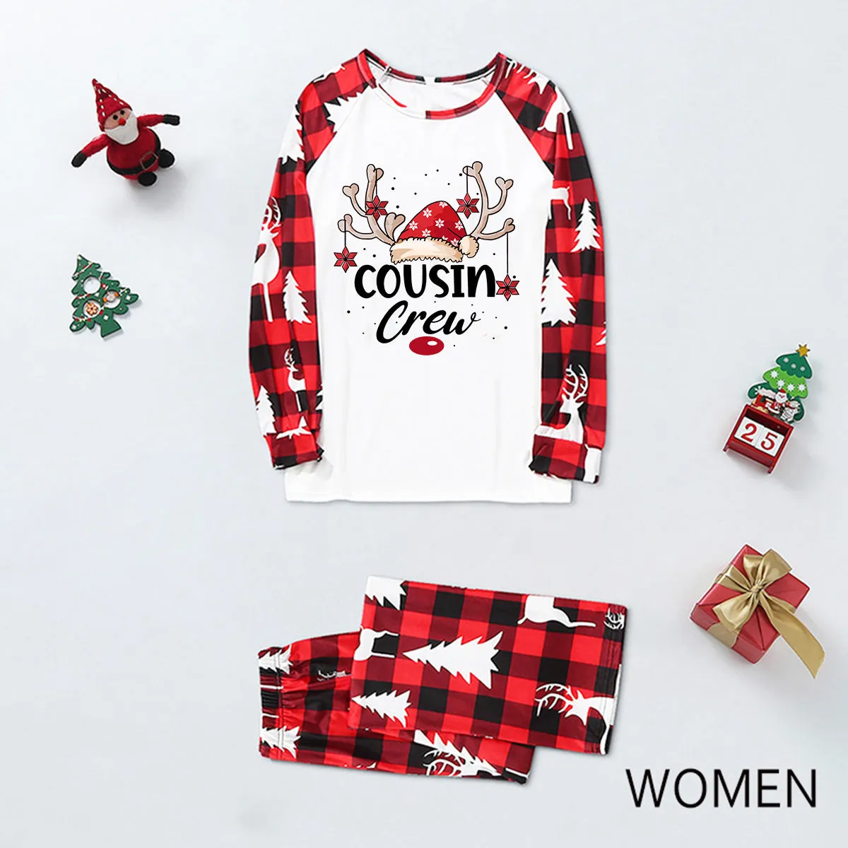 Cousin Crew Christmas pajama set with reindeer print