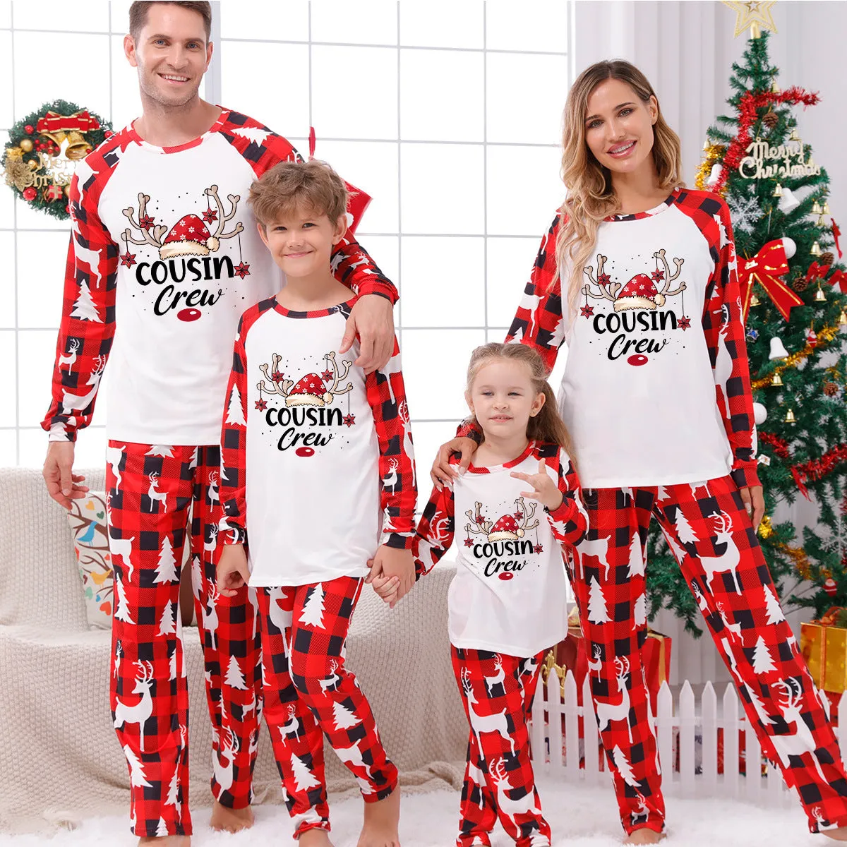 Cousin Crew Christmas pajama set with reindeer print