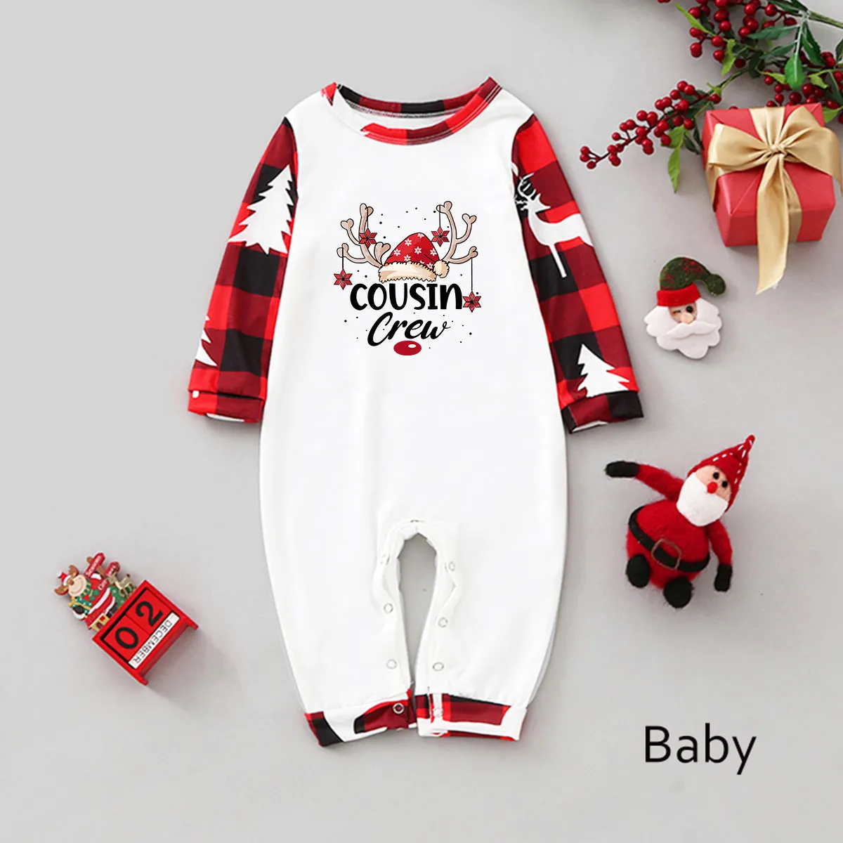 Cousin Crew Christmas pajama set with reindeer print