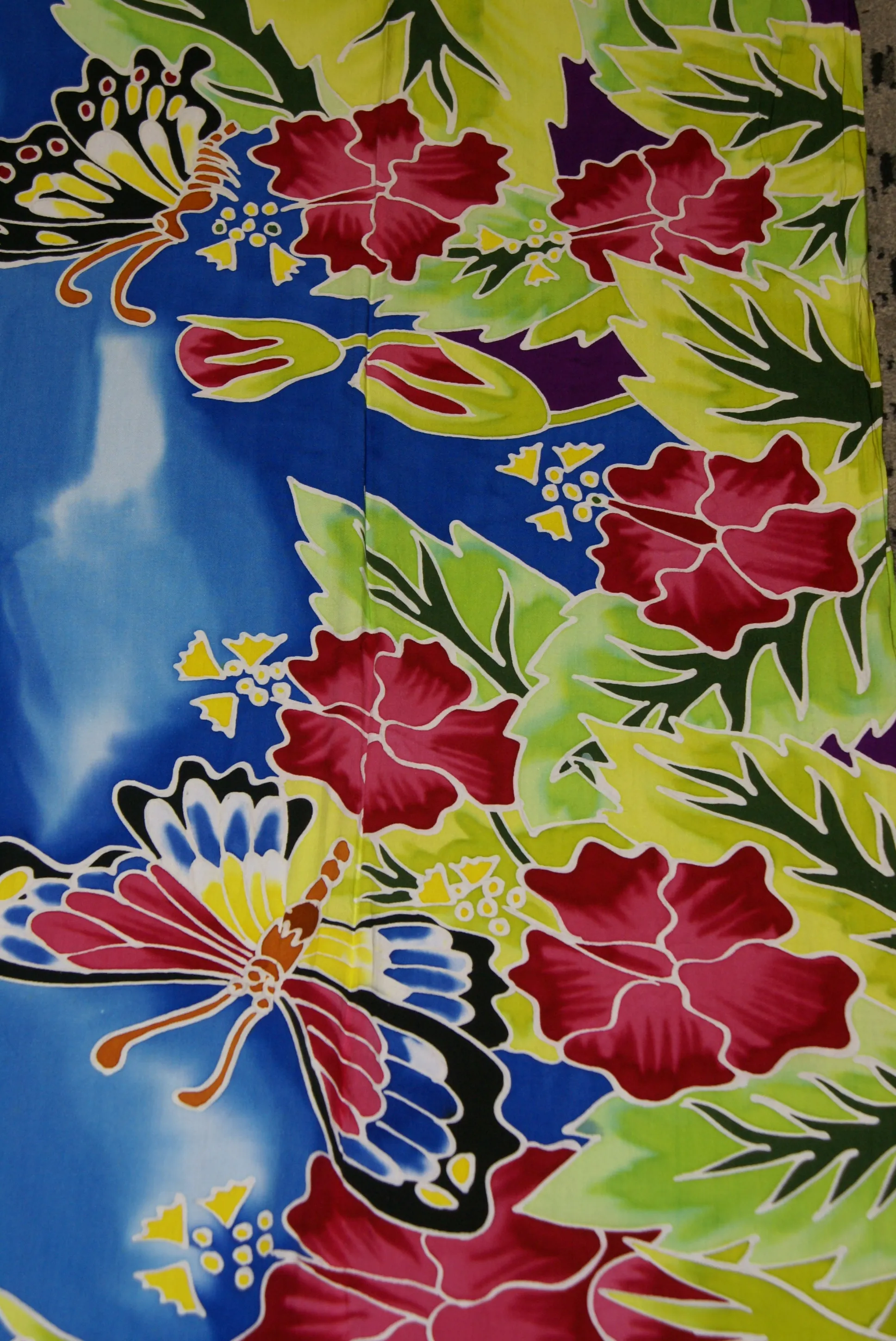 HIGH QUALITY HAND PAINTED TEXTILE FABRIC HALF SARONG OR BEACH SKIRT, SUMMER TABLE RUNNER, SIGNED BY THE ARTIST: DETAILED MOTIFS OF BLOOMING HIBISCUS & BUTTERFLIES ON BLUE SKY, RICH COLORS 74" x 23" (no SC13)